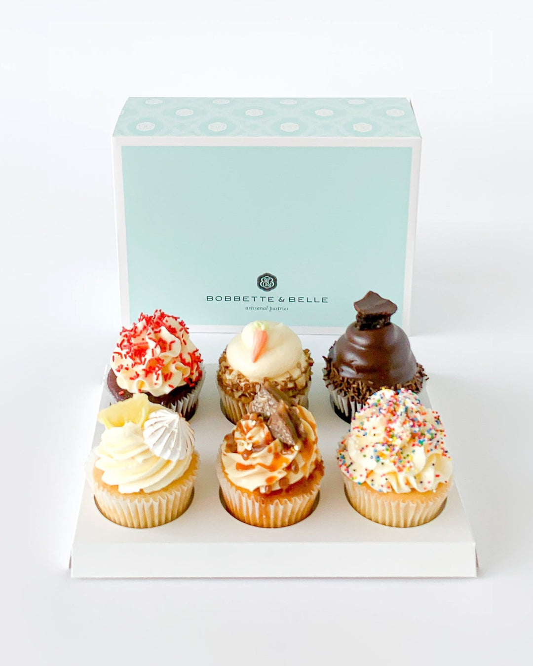 6 assorted cupcakes in a Bobbette & Belle box