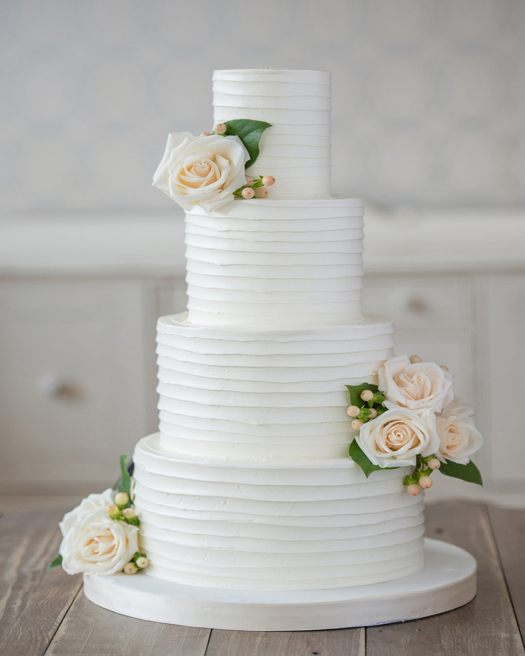 Classic buttercream swirl tiered wedding cake, by Bobbette & Belle Toronto