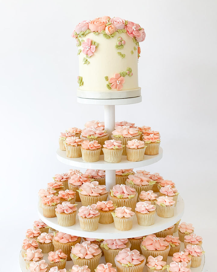 Garden in Bloom cupcake tower with piped buttercream flowers for a wedding or event