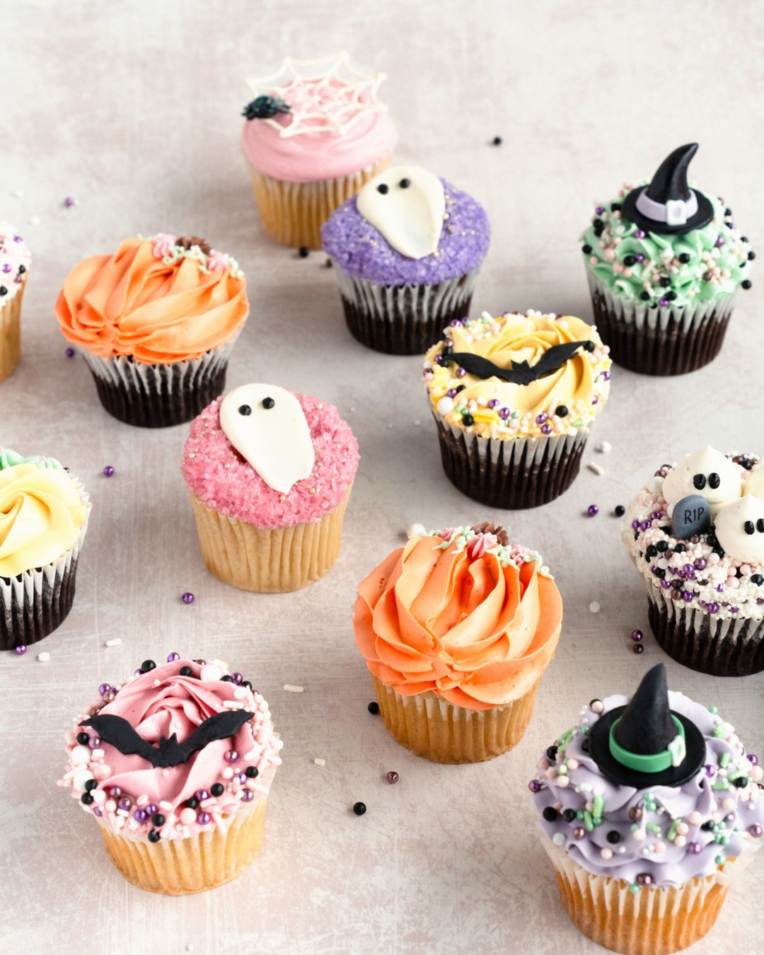 Assortment of pastel Halloween cupcakes