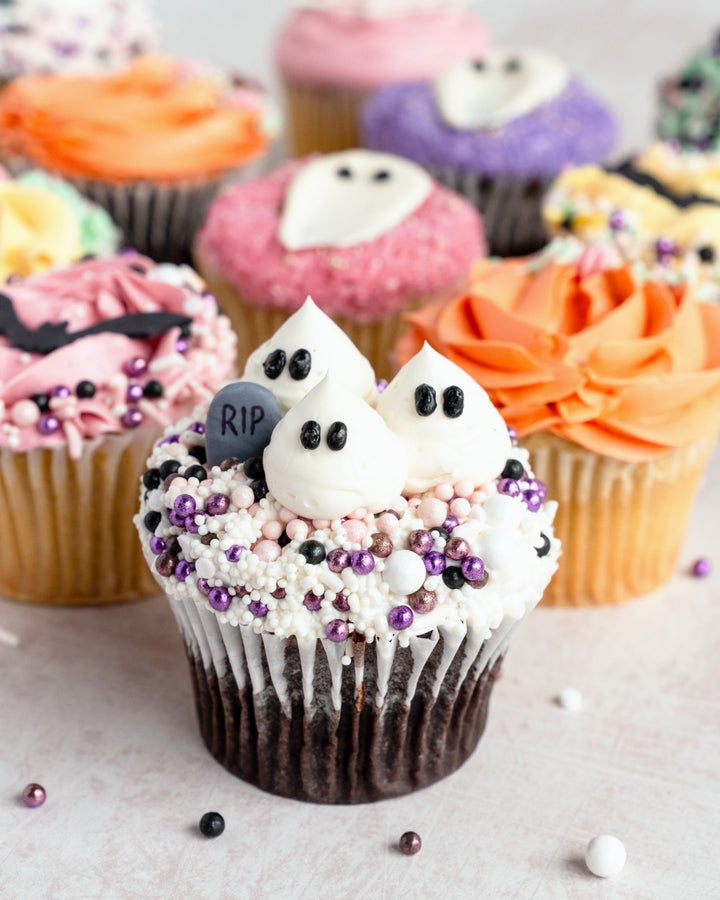 Chocolate ghost Halloween cupcake with sprinkles