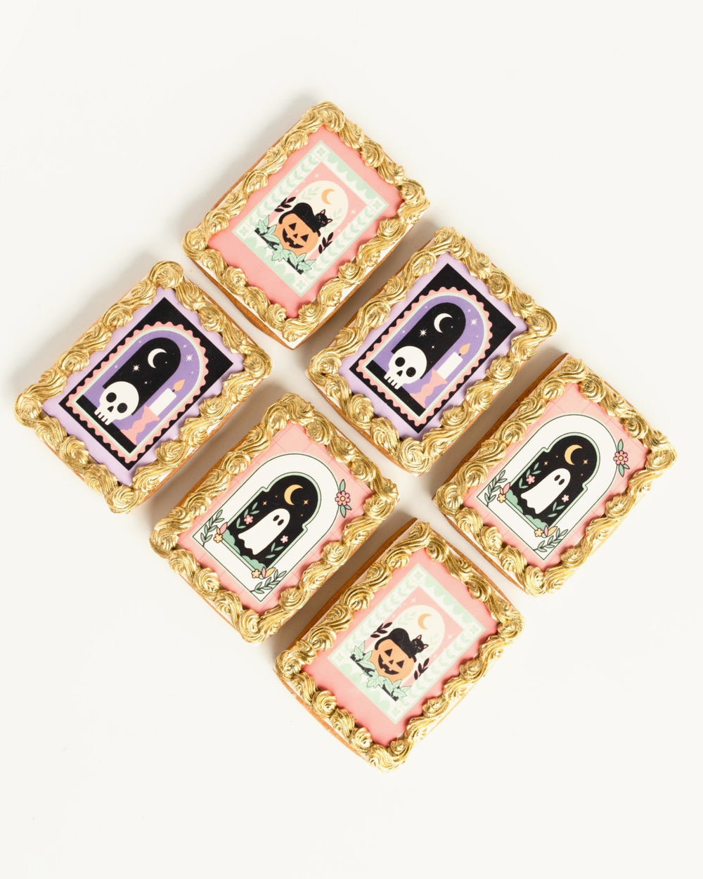 Halloween framed sugar cookies with gold piped frames