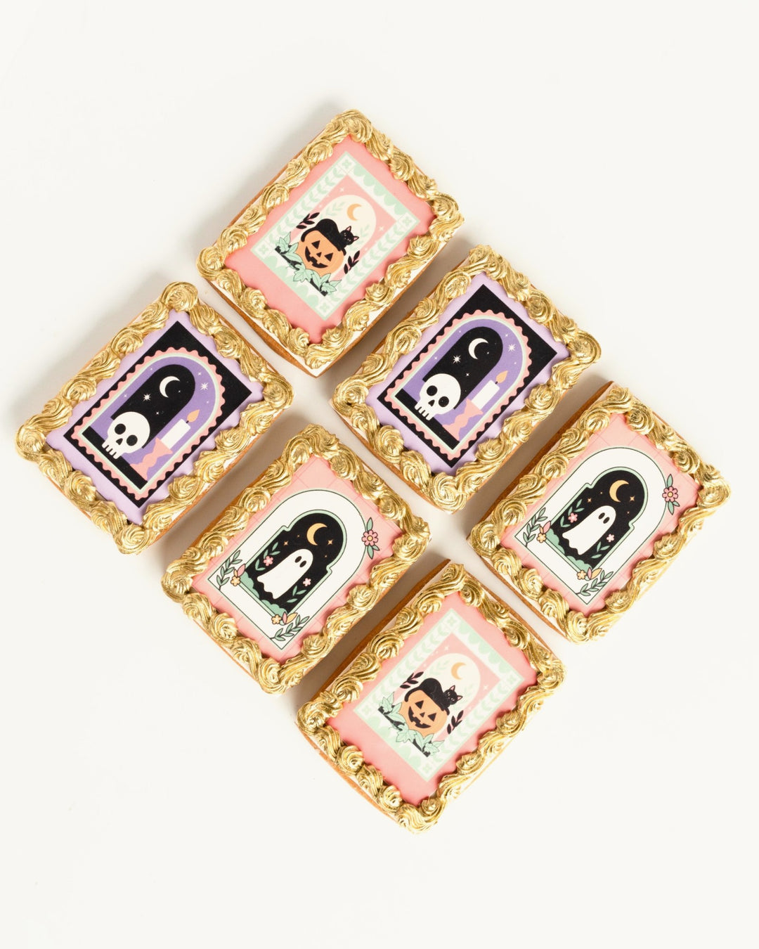 Halloween framed sugar cookies with gold piped frames