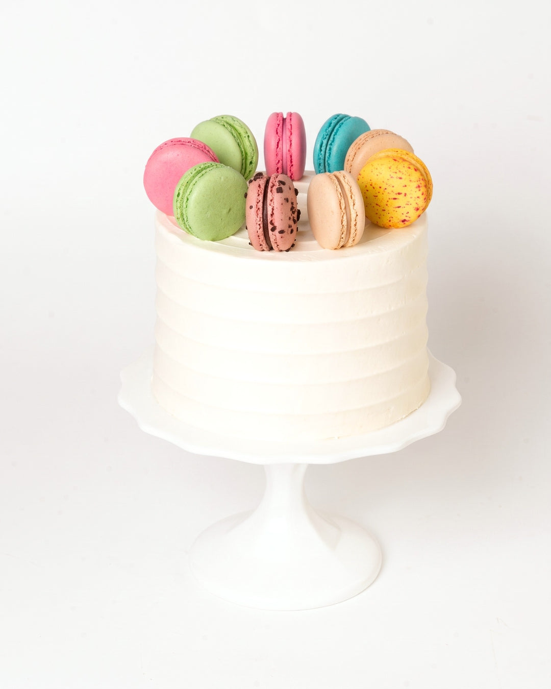 Macaron Lovers Cake by Bobbette & Belle, topped with nine French macarons