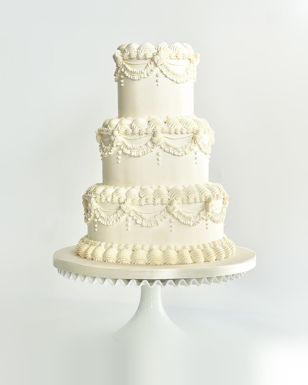 Piped Buttercream Finish wedding cake with Lambeth-style piping by Bobbette & Belle