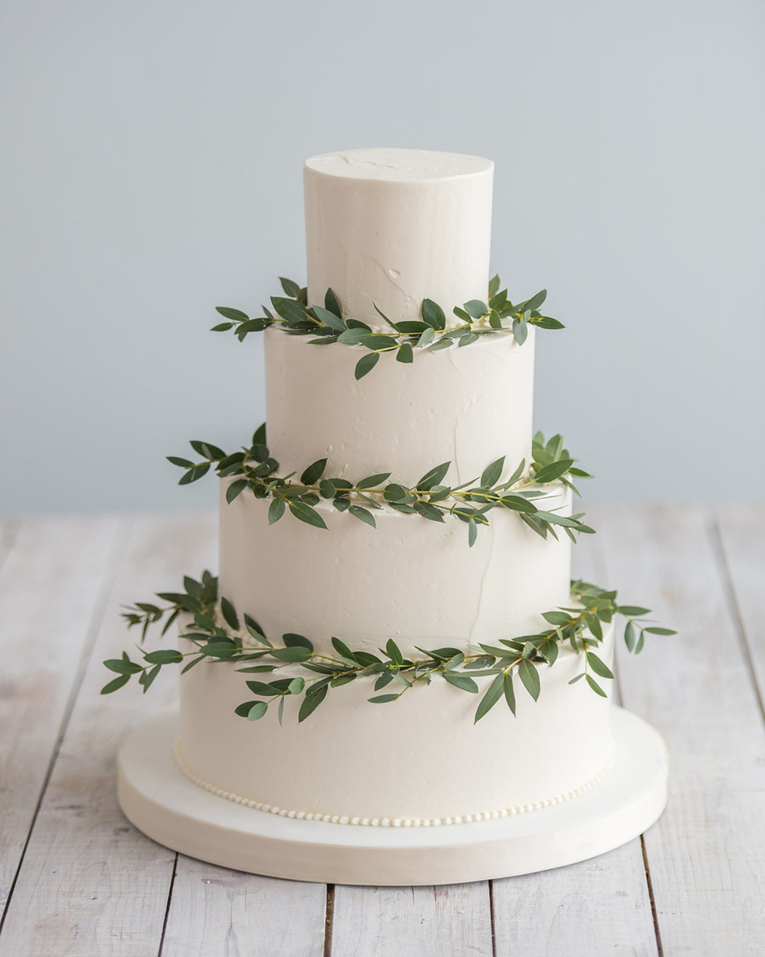 Smooth buttercream tiered wedding cake, by Bobbette & Belle Toronto