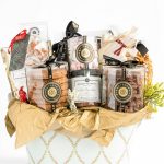 Luxury holiday gift basket with cookies, hot chocolate, marshmallows, and sweets