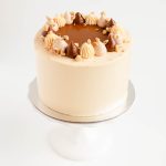 Caramel hazelnut Dacquoise cake with caramel centre buttercream and roasted hazelnuts