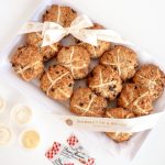 tray of hot cross scones with crosses served with devonshire cream lemon curd and jam